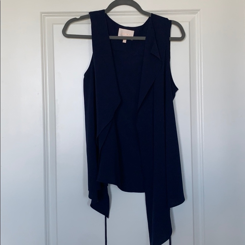Skies are blue navy tie blouse
